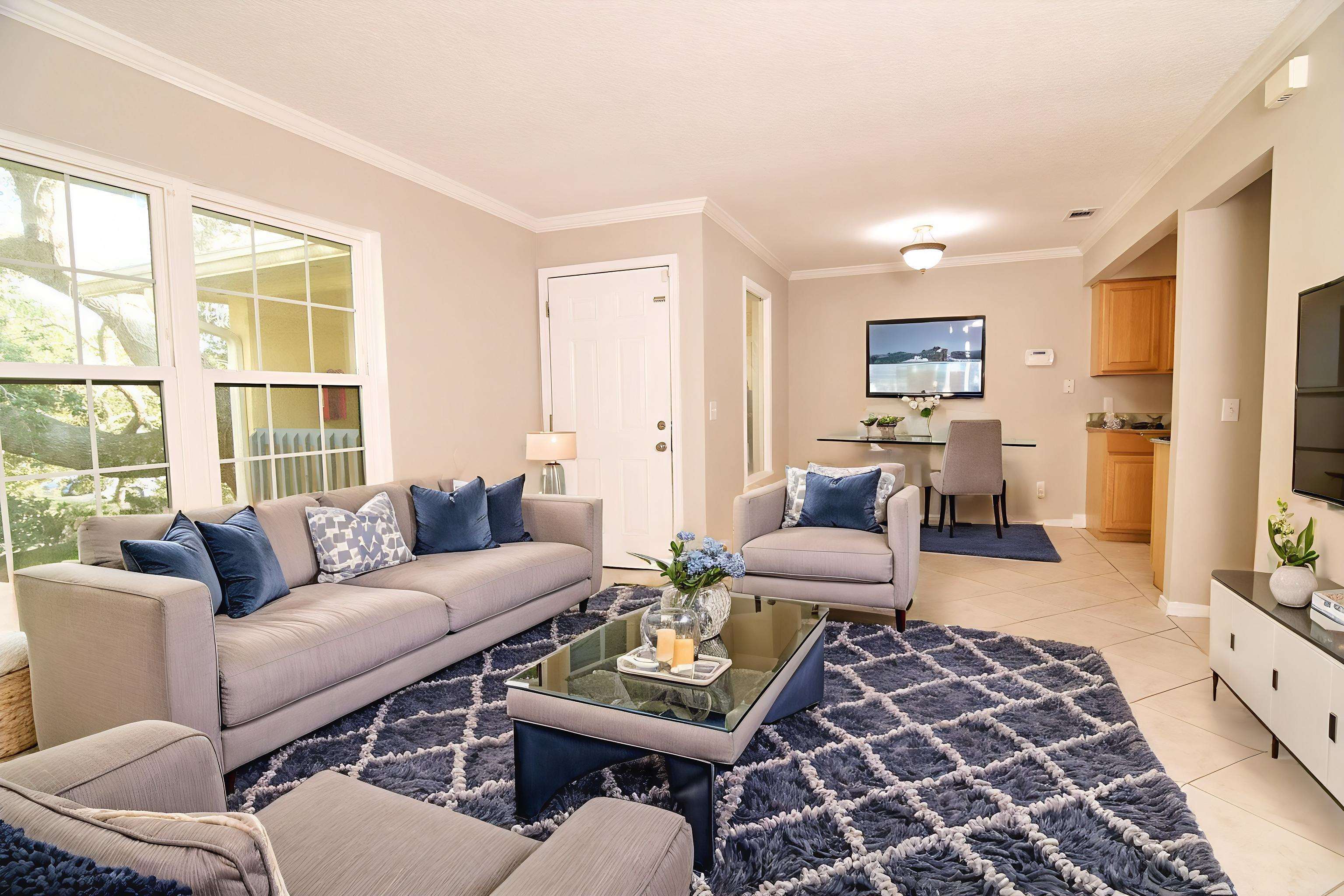 a living room with furniture and a couch