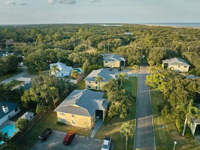 an aerial view of residential building with outdoor space