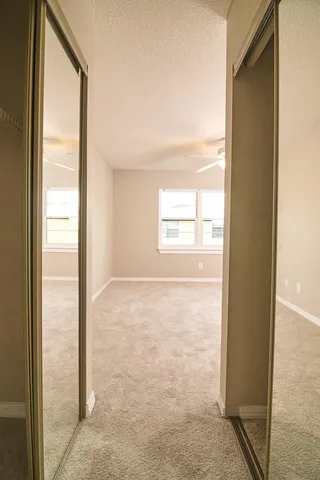 a bathroom with a toilet and shower