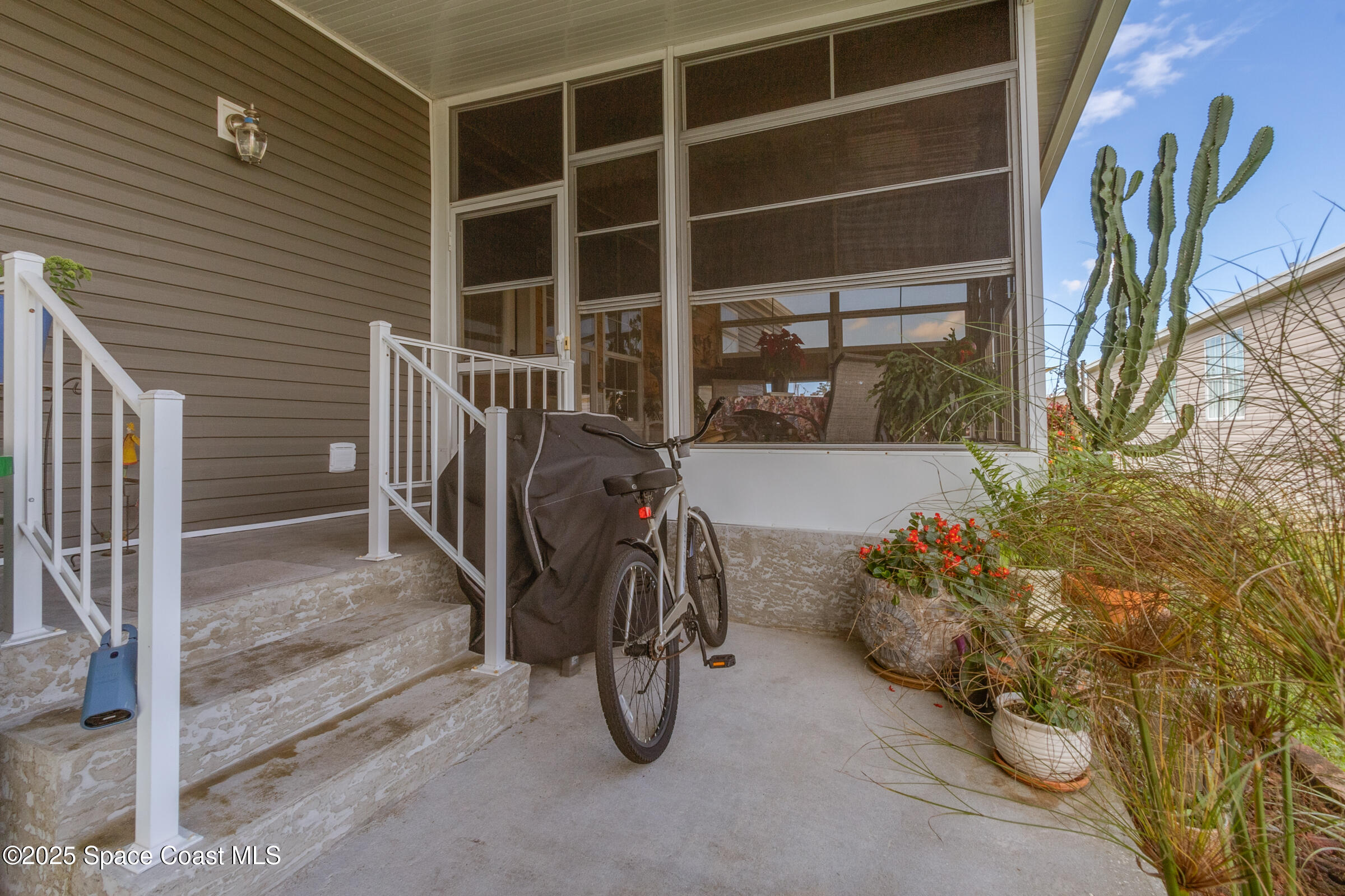 694 Outer Drive, Unit 184 Cocoa, FL 32926 - Photo 31 of 38 a view of outdoor space and porch