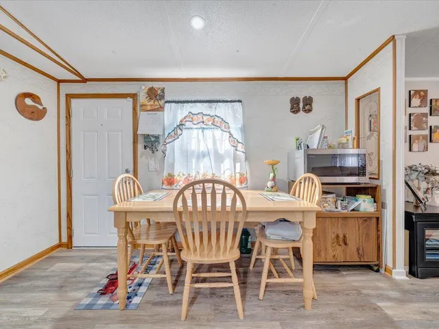 a view of a dining room with furniture