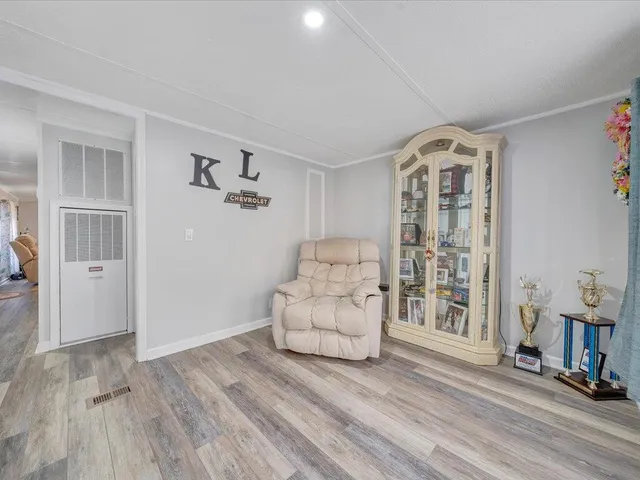 a view of livingroom with furniture and wooden floor