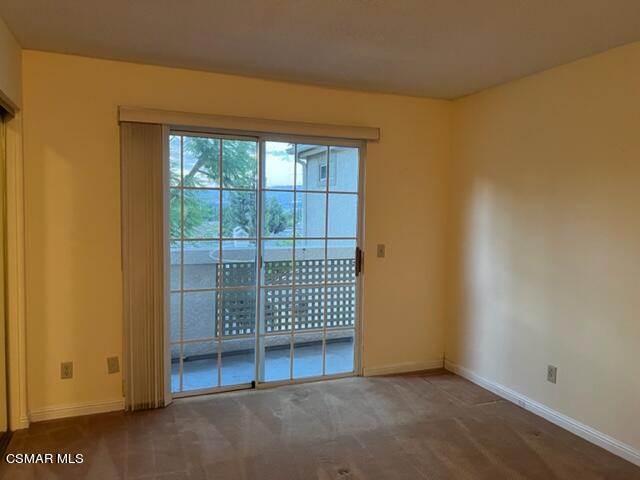 1225 Fitzgerald Road, Unit E Simi Valley, CA 93065 - Photo 17 of 30 a view of an empty room with a window