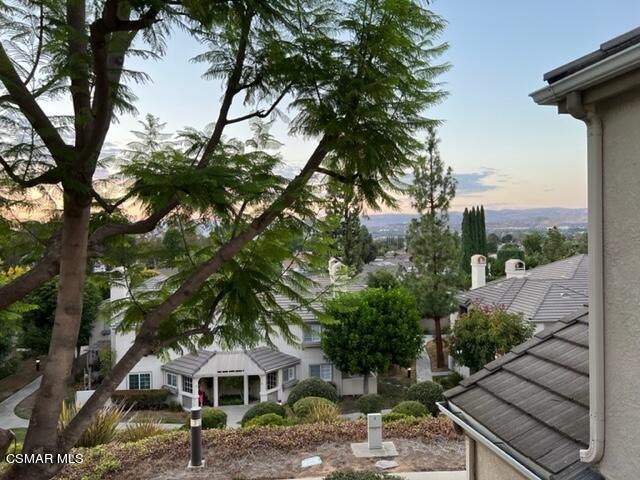 1225 Fitzgerald Road, Unit E Simi Valley, CA 93065 - Photo 21 of 30 a front view of a house with garden