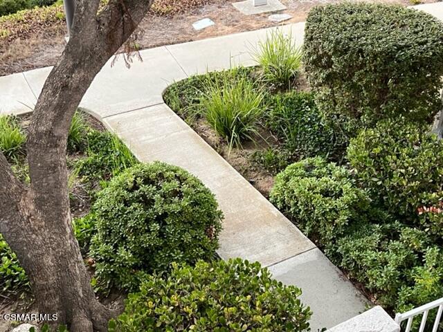 1225 Fitzgerald Road, Unit E Simi Valley, CA 93065 - Photo 23 of 30 a view of a garden with a pathway