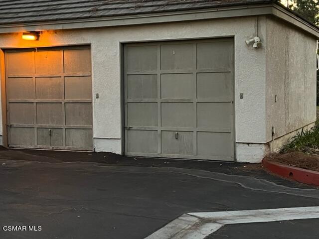 1225 Fitzgerald Road, Unit E Simi Valley, CA 93065 - Photo 30 of 30 a view of a car garage gate