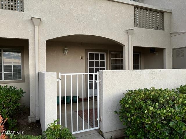 1225 Fitzgerald Road, Unit E Simi Valley, CA 93065 - Photo 3 of 30 a front view of a house with stairs