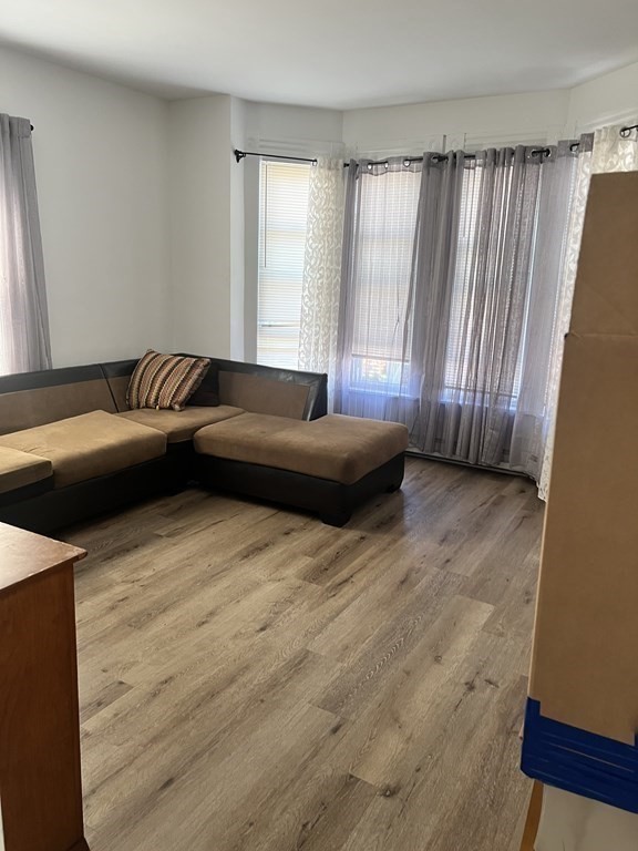 95-97 Tenney Street Methuen, MA 01844 - Photo 12 of 19 a bedroom with a bed and a window