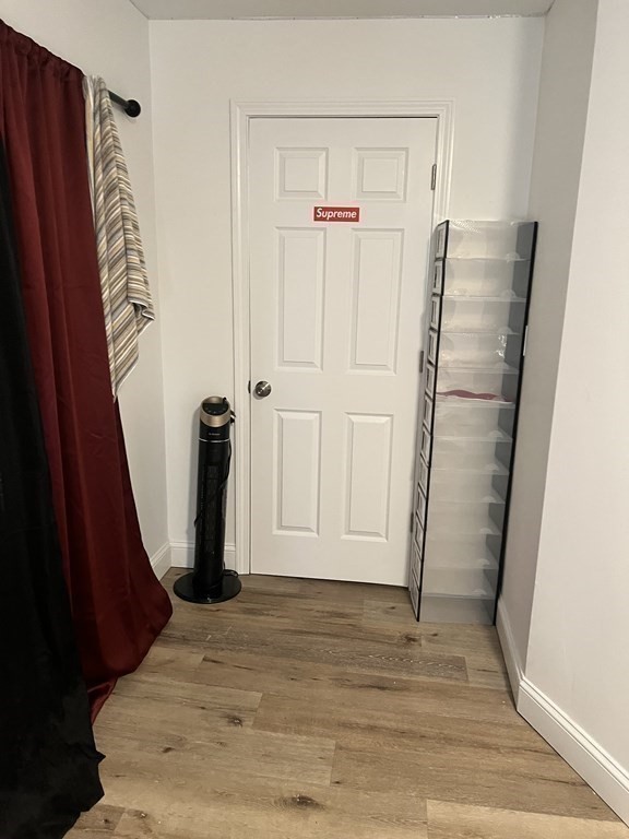 95-97 Tenney Street Methuen, MA 01844 - Photo 18 of 19 a view of walk in closet with hardwood floor