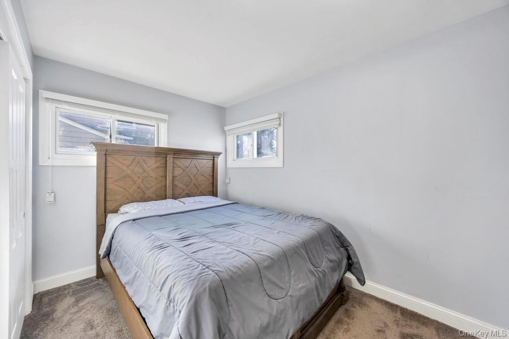 111 Blacksmith Road East Levittown, NY 11756 - Photo 11 of 14 Bedroom featuring carpet