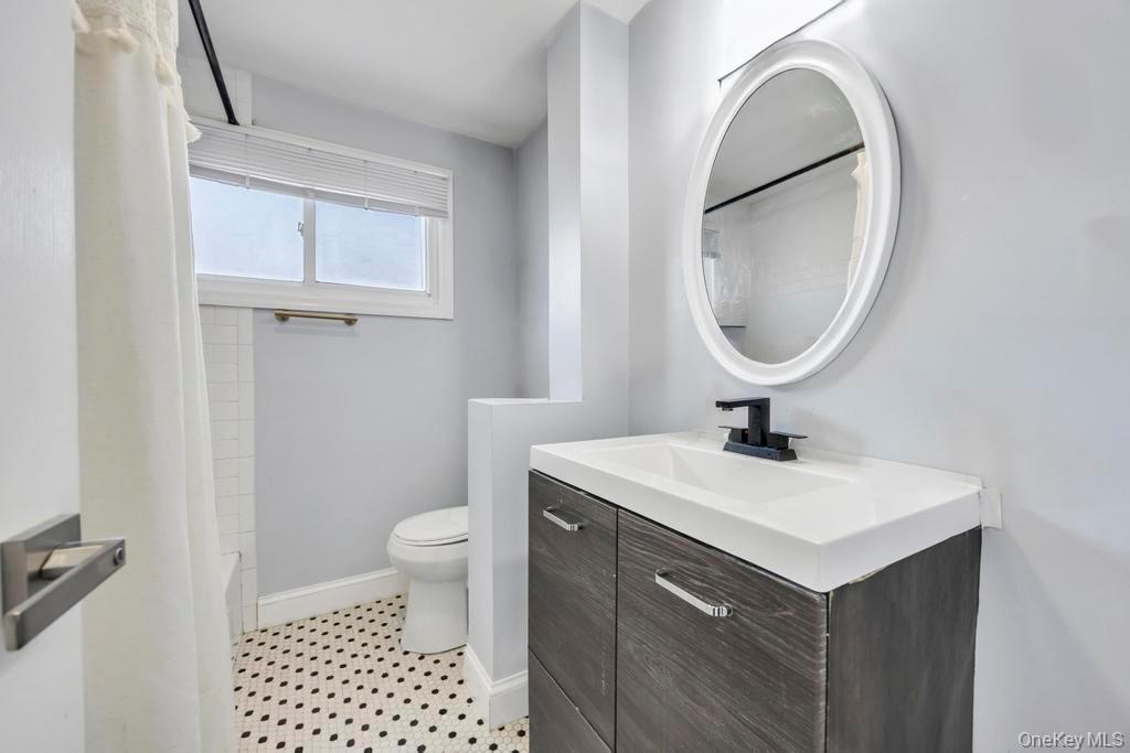 111 Blacksmith Road East Levittown, NY 11756 - Photo 8 of 14 Full bath featuring vanity and shower / bath combo