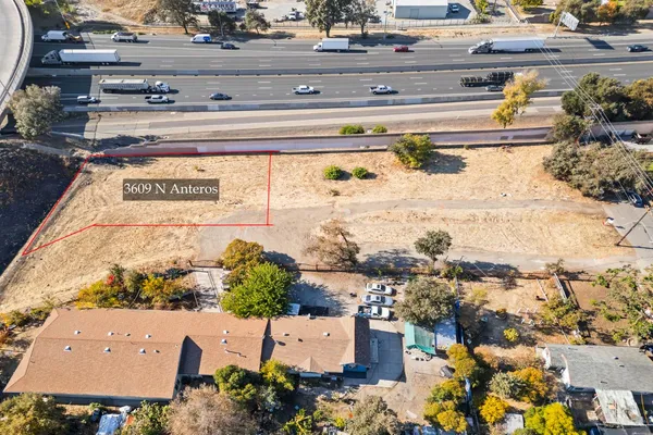 an aerial view of a building with outdoor space
