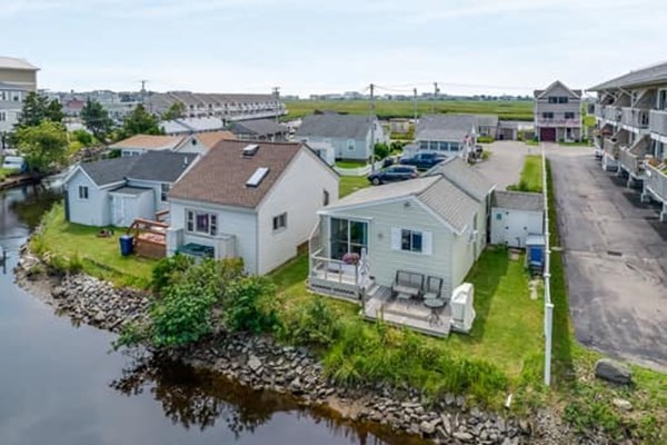 554 Winnacunnet Road, Unit A Hampton, NH 03842 - Photo 17 of 19 an aerial view of a house with a garden