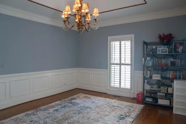 a kitchen with a stove a sink and a refrigerator