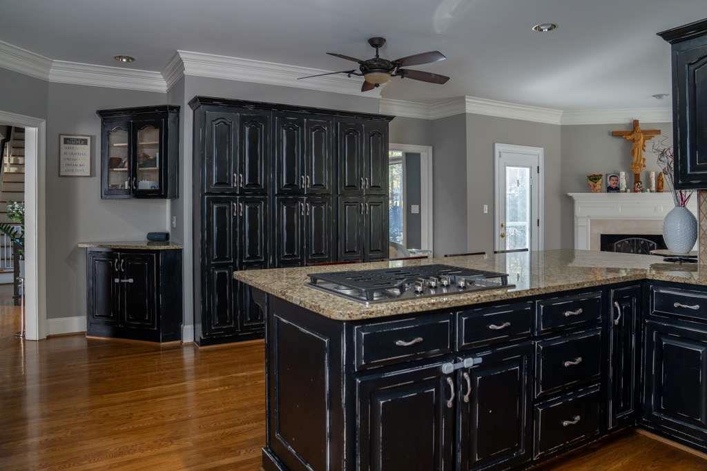 21 River Pine Drive Southwest Rome, GA 30165 - Photo 17 of 64 a kitchen with a stove a sink and a refrigerator