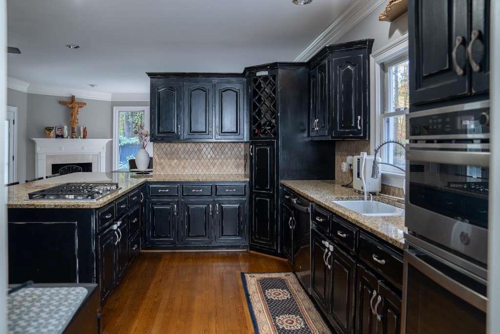 21 River Pine Drive Southwest Rome, GA 30165 - Photo 18 of 64 a kitchen with stainless steel appliances granite countertop a stove and a refrigerator