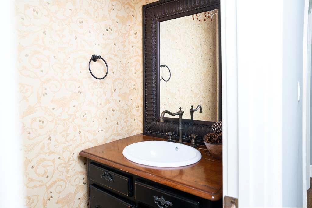 21 River Pine Drive Southwest Rome, GA 30165 - Photo 31 of 64 a bathroom with a sink and a mirror