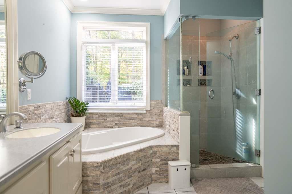 21 River Pine Drive Southwest Rome, GA 30165 - Photo 36 of 64 a bathroom with a granite countertop tub shower and sink