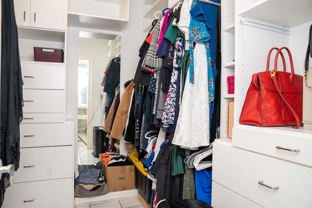 21 River Pine Drive Southwest Rome, GA 30165 - Photo 38 of 64 a view of walk in closet with clothes and shoes