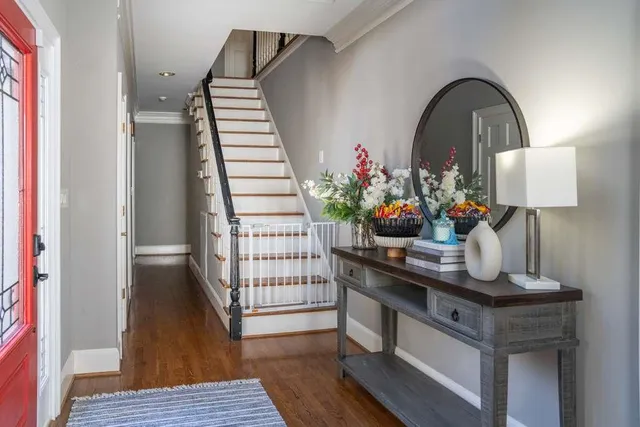 a dining room with table and chairs