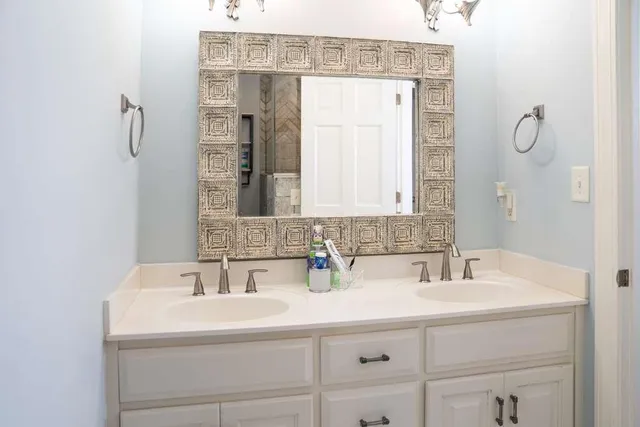a kitchen with stainless steel appliances granite countertop a stove and cabinets