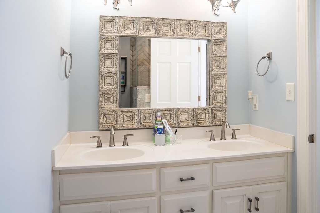 21 River Pine Drive Southwest Rome, GA 30165 - Photo 43 of 64 a bathroom with a sink and a mirror