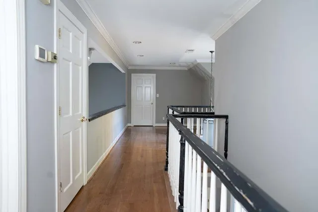 a utility room with multiple dryer and washer
