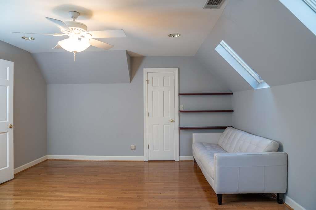 21 River Pine Drive Southwest Rome, GA 30165 - Photo 47 of 64 a living room with furniture and a chandelier
