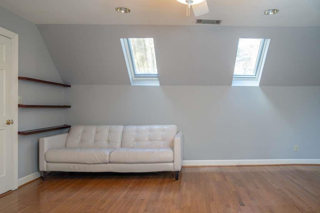 21 River Pine Drive Southwest Rome, GA 30165 - Photo 48 of 64 a living room with furniture and a wooden floor
