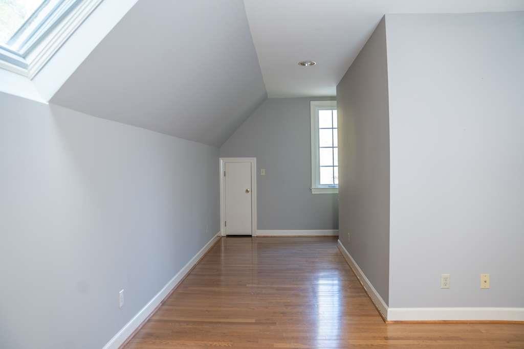 21 River Pine Drive Southwest Rome, GA 30165 - Photo 49 of 64 a view of hallway with window and wooden floor