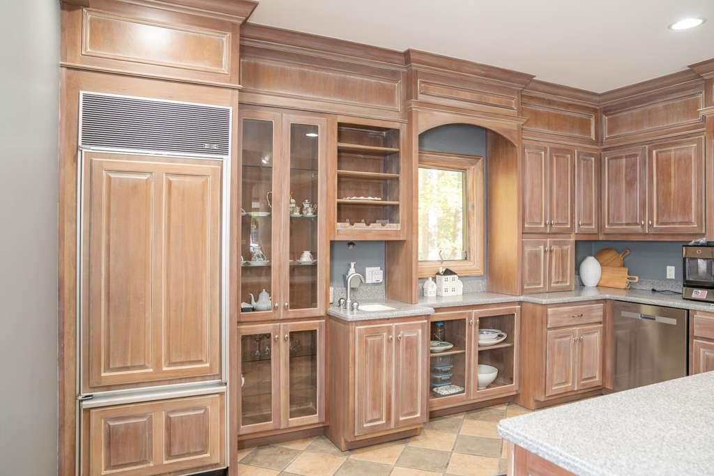 21 River Pine Drive Southwest Rome, GA 30165 - Photo 52 of 64 a kitchen with stainless steel appliances granite countertop a stove and cabinets