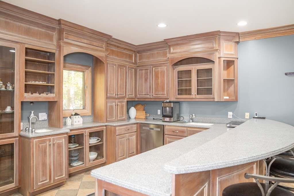 21 River Pine Drive Southwest Rome, GA 30165 - Photo 53 of 64 a kitchen with a sink stove and cabinets