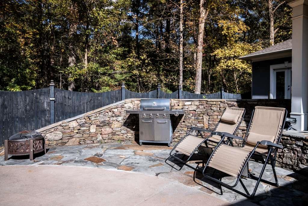 21 River Pine Drive Southwest Rome, GA 30165 - Photo 60 of 64 a view of a patio with couple of chairs
