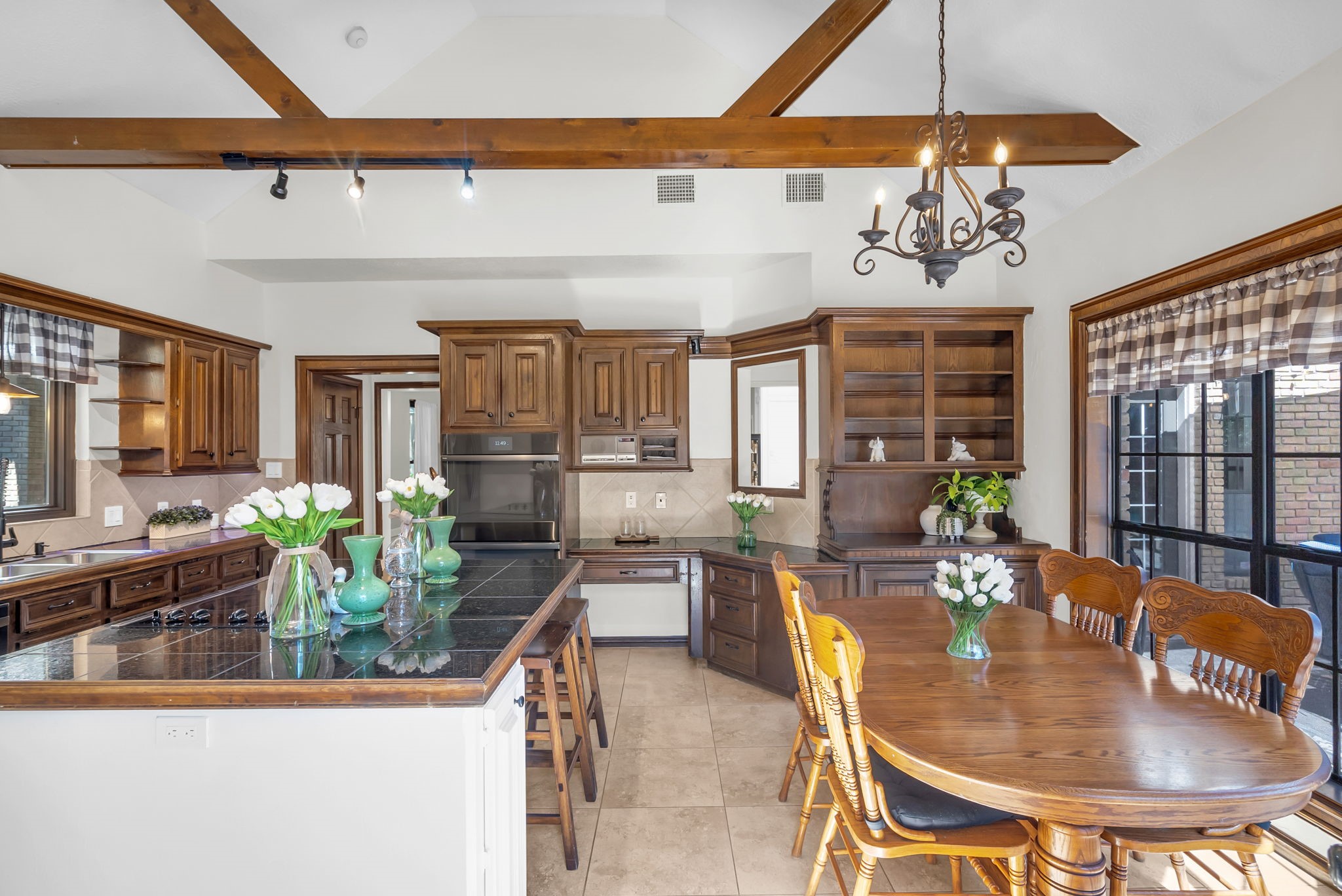 6034 Oak Creek Lane Spring, TX 77379 - Photo 15 of 42 Another view of the Kitchen & the Wood Accent Beam! 6034 Oak Creek Ln., Spring, TX 77379