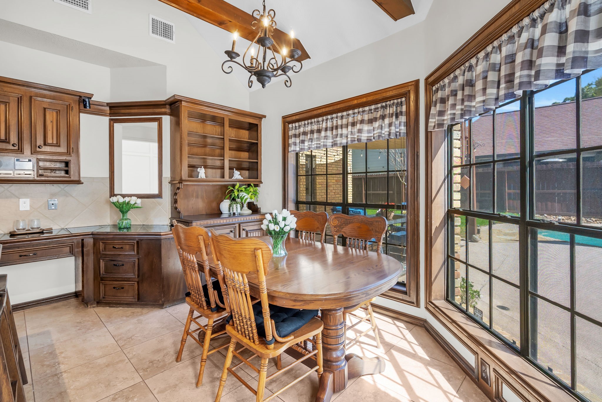 6034 Oak Creek Lane Spring, TX 77379 - Photo 16 of 42 This Breakfast Space features large windows to allow a view of the Backyard space. 6034 Oak Creek Ln., Spring, TX 77379