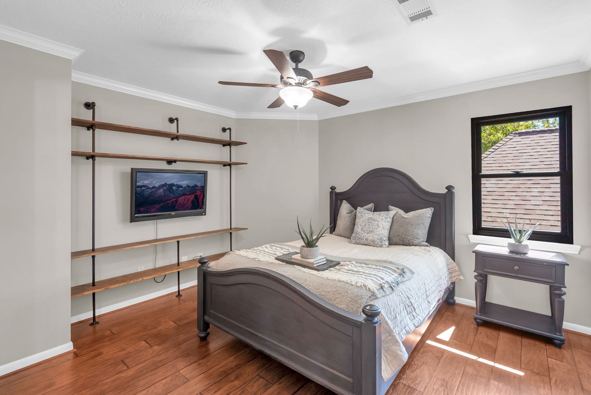 6034 Oak Creek Lane Spring, TX 77379 - Photo 27 of 42 This Secondary Bedroom is located next to the Game Room. Lots of natural light, high ceilings and a ceiling fan! 6034 Oak Creek Ln., Spring, TX 77379