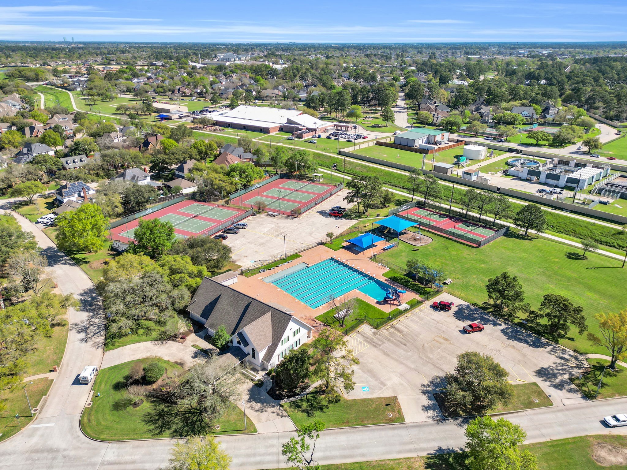 6034 Oak Creek Lane Spring, TX 77379 - Photo 38 of 42 Amenity Center featuring Tennis Courts, Pickleball Courts, Pool, Large Grassy Area! 6034 Oak Creek Ln., Spring, TX 77379