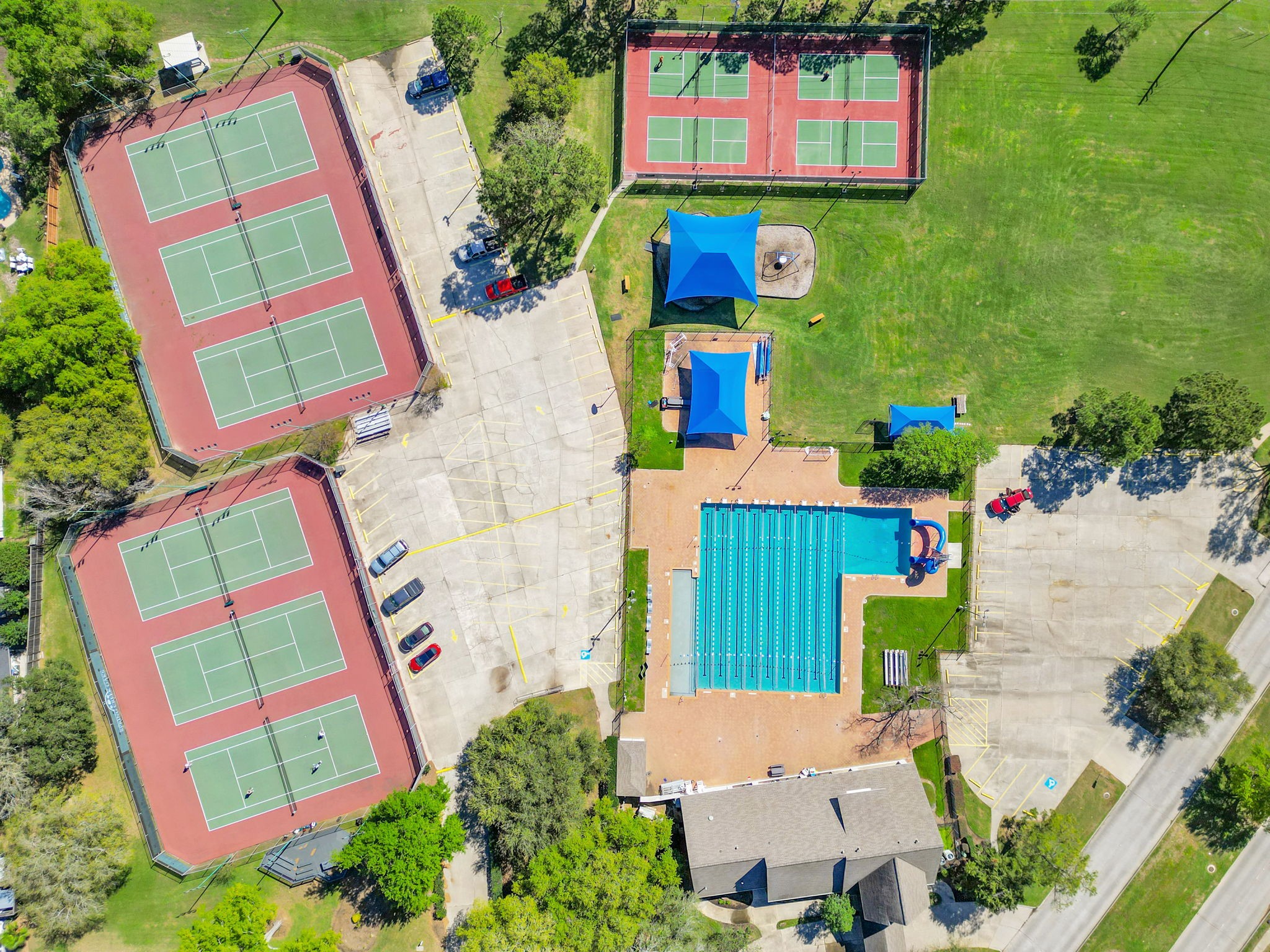 6034 Oak Creek Lane Spring, TX 77379 - Photo 39 of 42 Aerial View of the Amenity Center - Tennis Courts, Pickleball Courts, Swimming Pool! 6034 Oak Creek Ln., Spring, TX 77379
