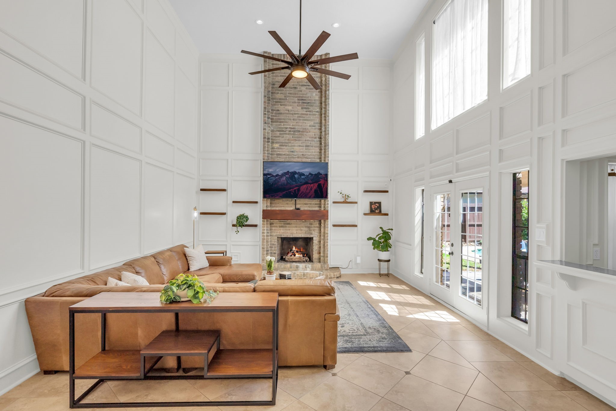 6034 Oak Creek Lane Spring, TX 77379 - Photo 8 of 42 This Living Room allows lots of natural light throughout featuring an oversized ceiling fan! 6034 Oak Creek Ln., Spring, TX 77379