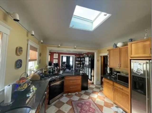 a large living room with furniture