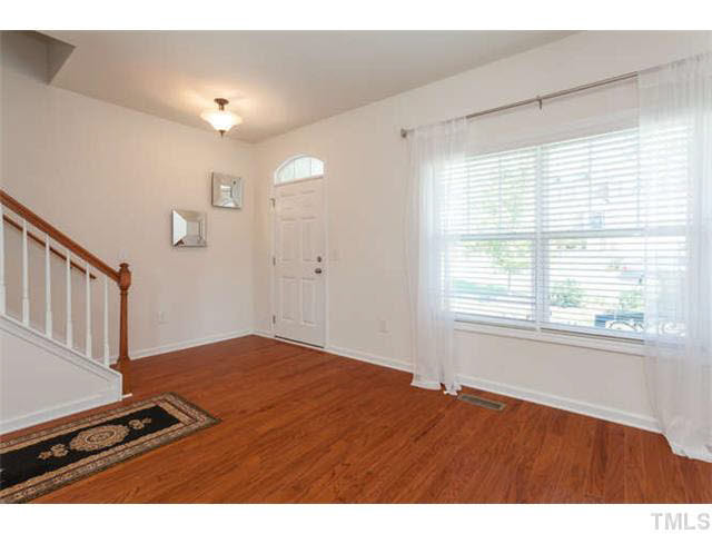 1413 Pattersons Mill Road Durham, NC 27703 - Photo 2 of 25 Bright and open foyer that leads into the living room. Living Room