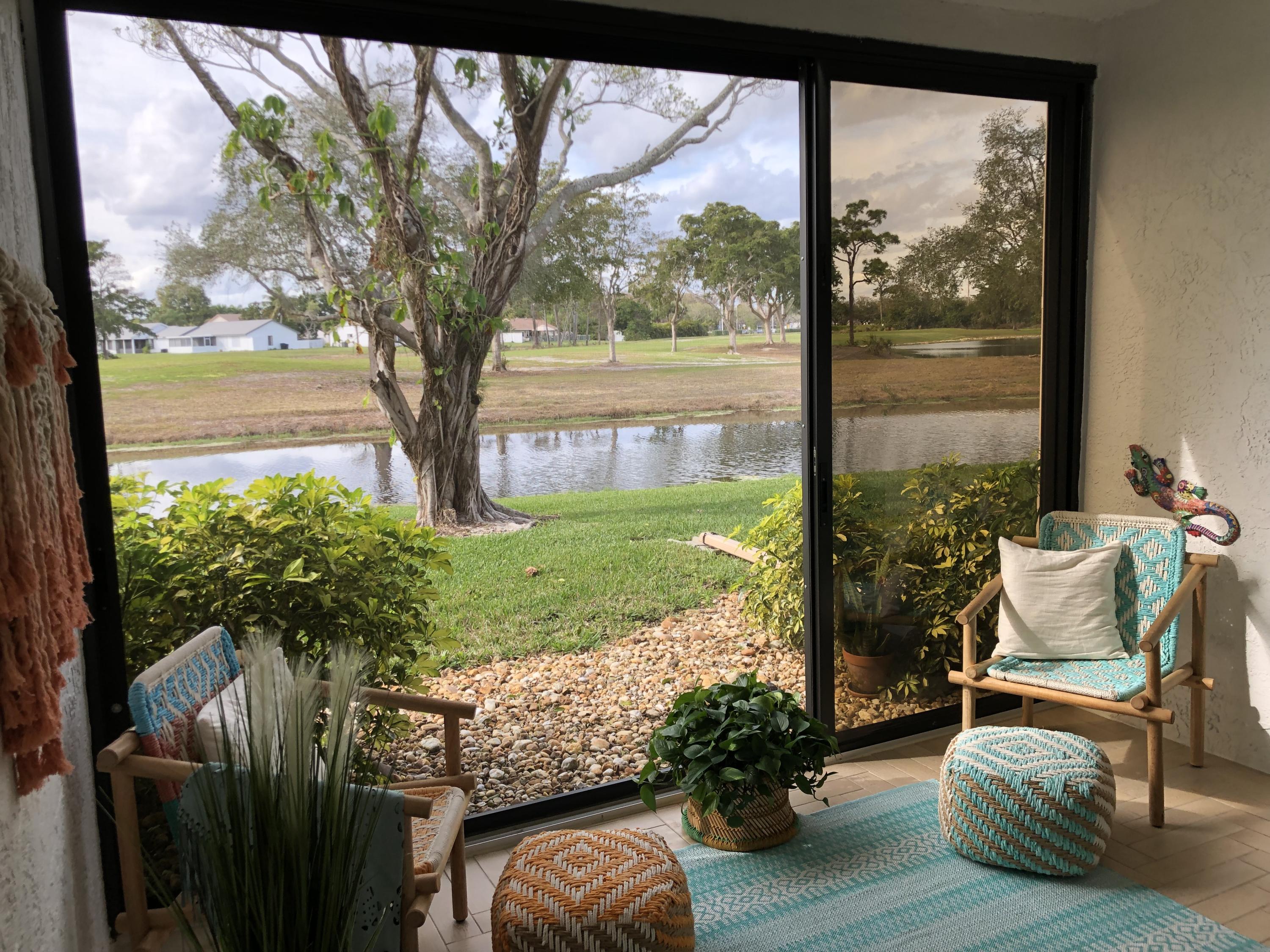 9290 Vista Del Lago, Unit 11C Boca Raton, FL 33428 - Photo 2 of 27 Florida Room