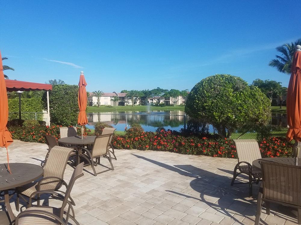 9290 Vista Del Lago, Unit 11C Boca Raton, FL 33428 - Photo 25 of 27 Pines Pool Deck