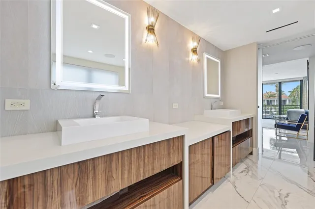 a view of a swimming pool with a buildings in the background