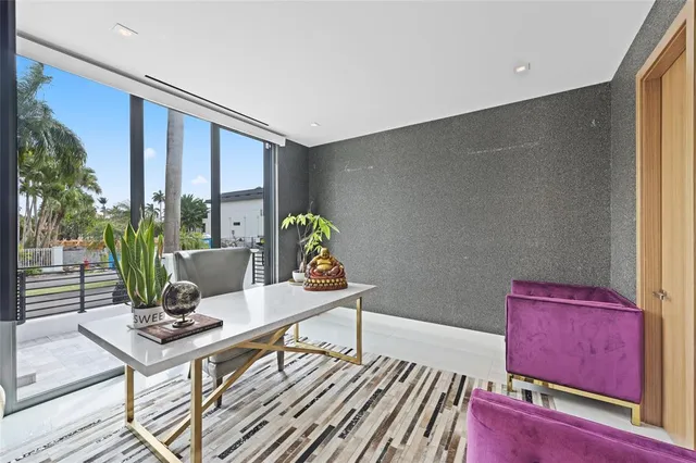 a kitchen with sink a stove and cabinets