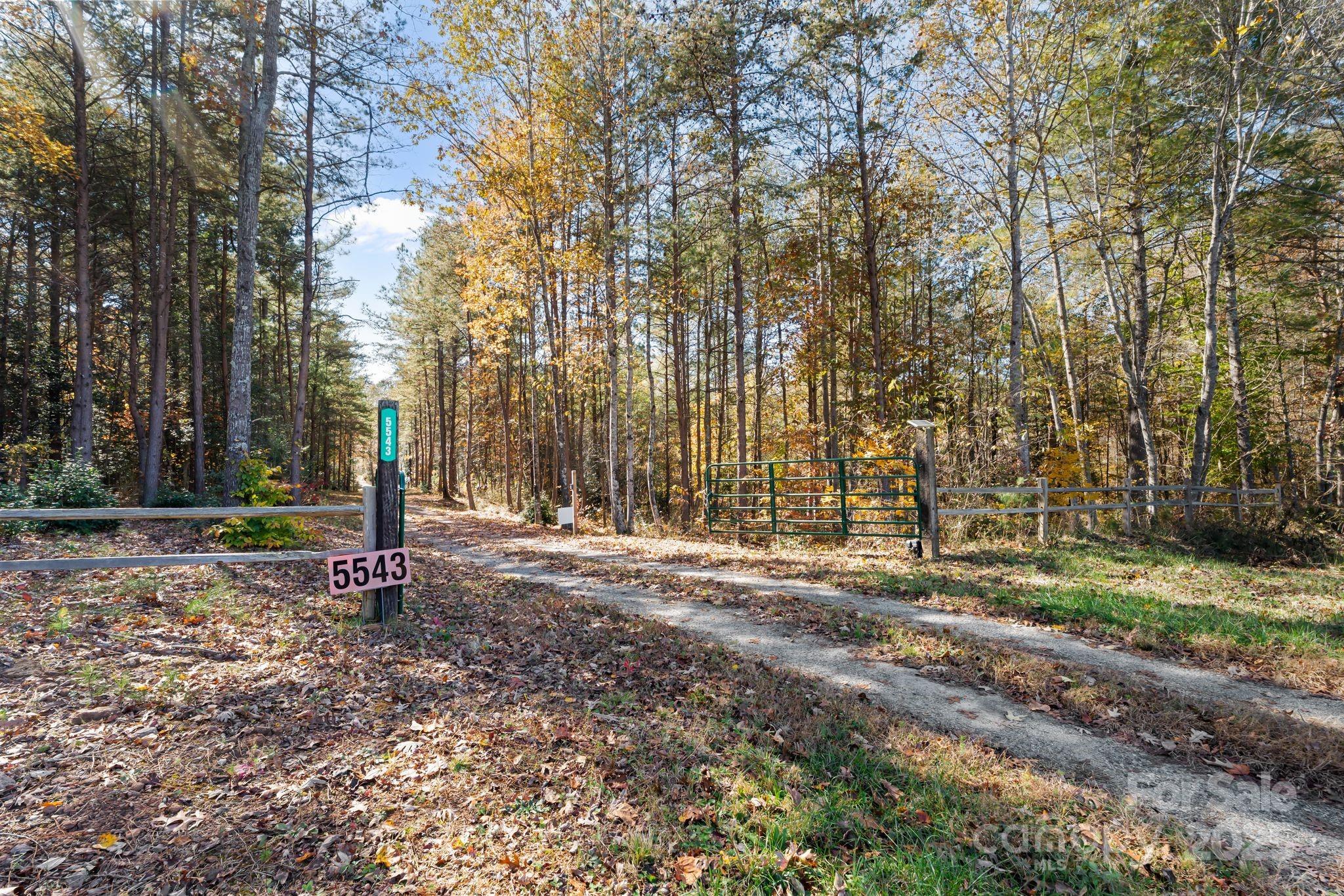 0 Liberty Road Granite Falls, NC 28630 - Photo 13 of 13 a view of a backyard with large trees