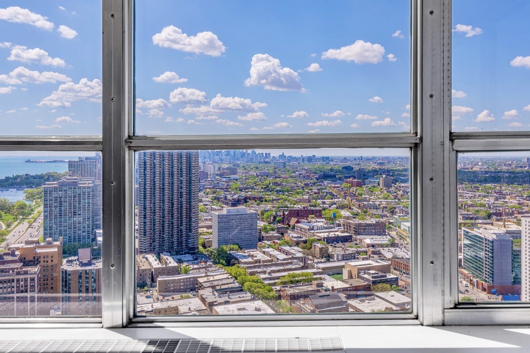 655 West Irving Park Road, Unit 4517 Chicago, IL 60613 - Photo 10 of 27 a view of a city with tall buildings
