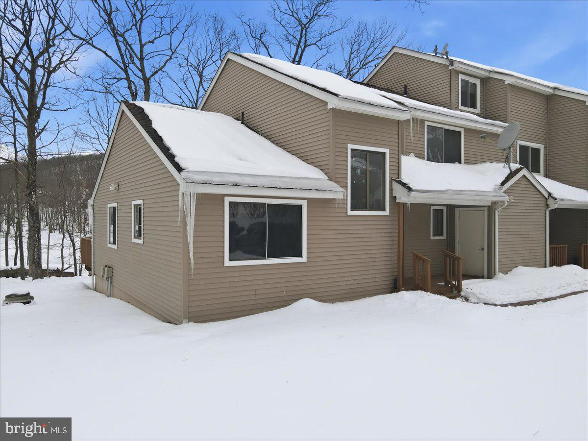 3301 Windemere Drive Bushkill, PA 18324 - Photo 2 of 70 a front view of a house with a yard