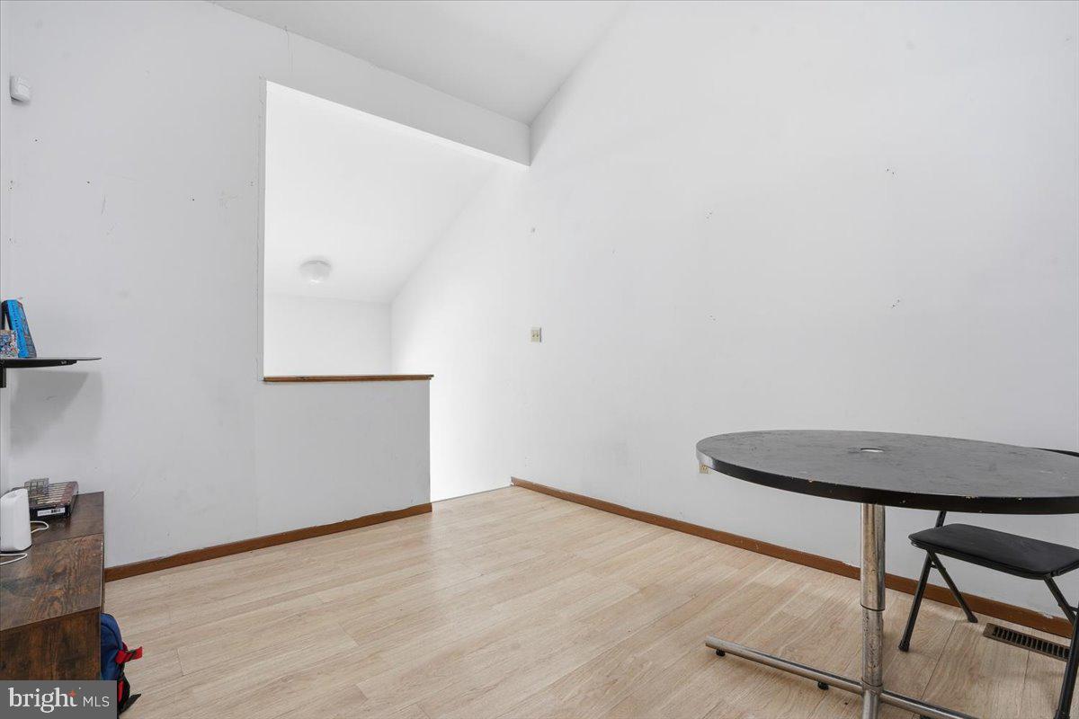 3301 Windemere Drive Bushkill, PA 18324 - Photo 26 of 70 a view of a room with wooden floor and a window