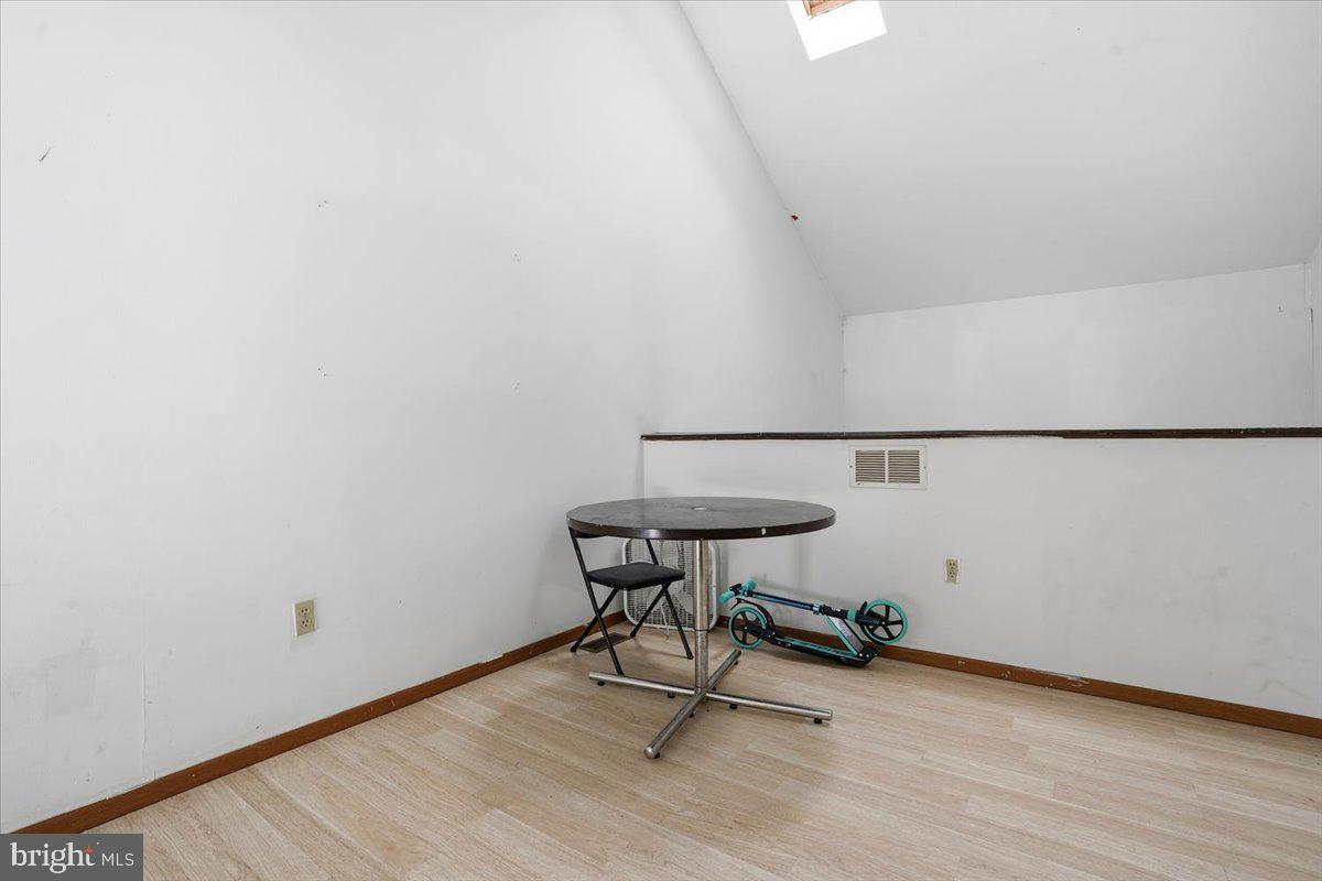 3301 Windemere Drive Bushkill, PA 18324 - Photo 27 of 70 a view of a room with a table and chairs